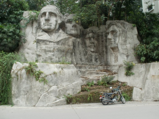 Illustration for article titled China's Mount Rushmore Has Green Leafy Hair